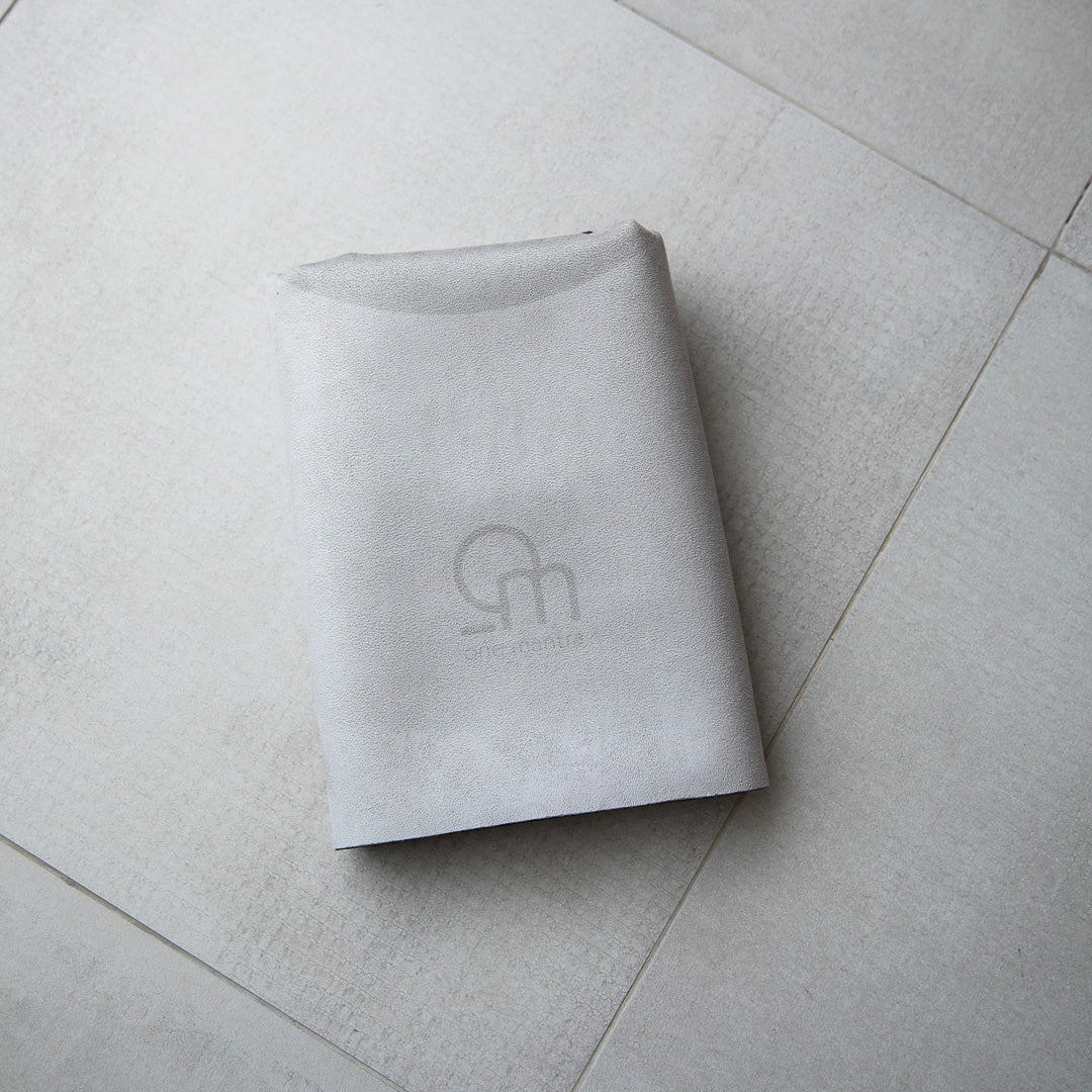 one mantra reise-yogamatte beige gefaltet